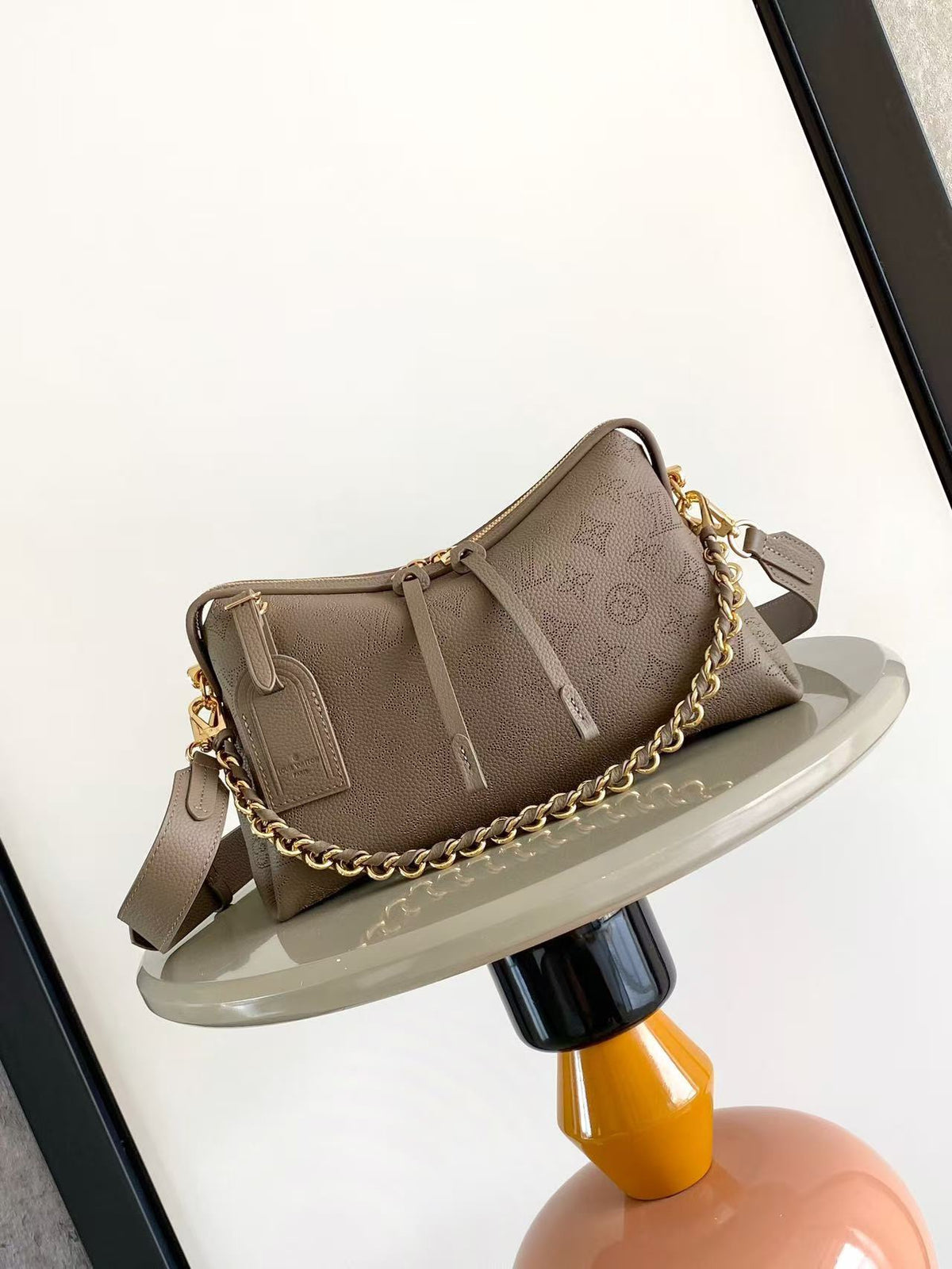 Louis Vuitton Hand It All PM Perforated Mahina Calfskin Leather bag